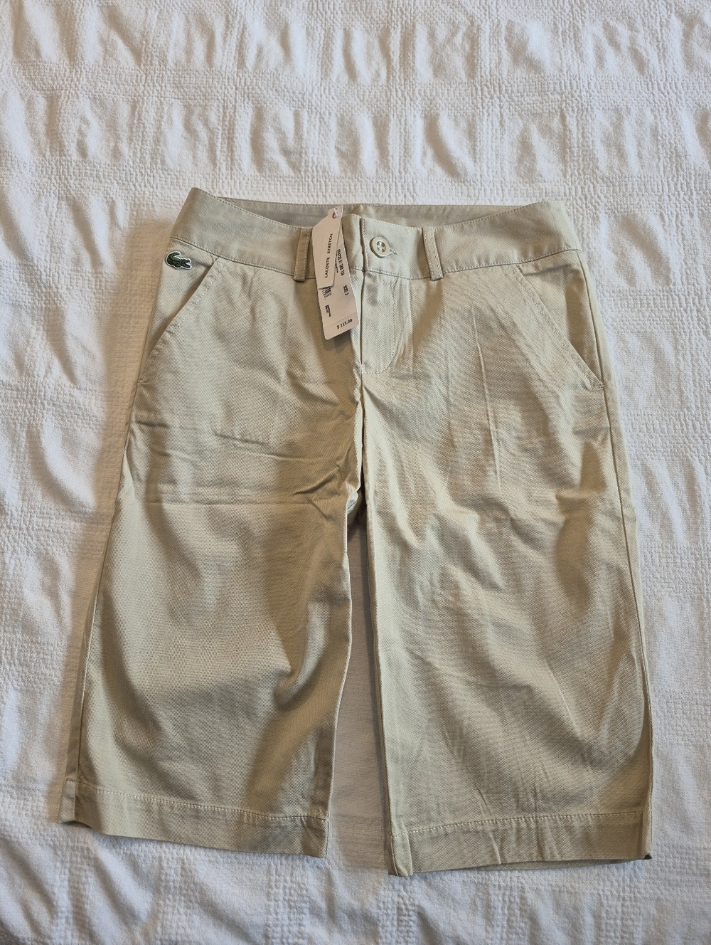 Lacoste women's size 2 3/4 length shorts tan 4 pockets have some stretch NWT